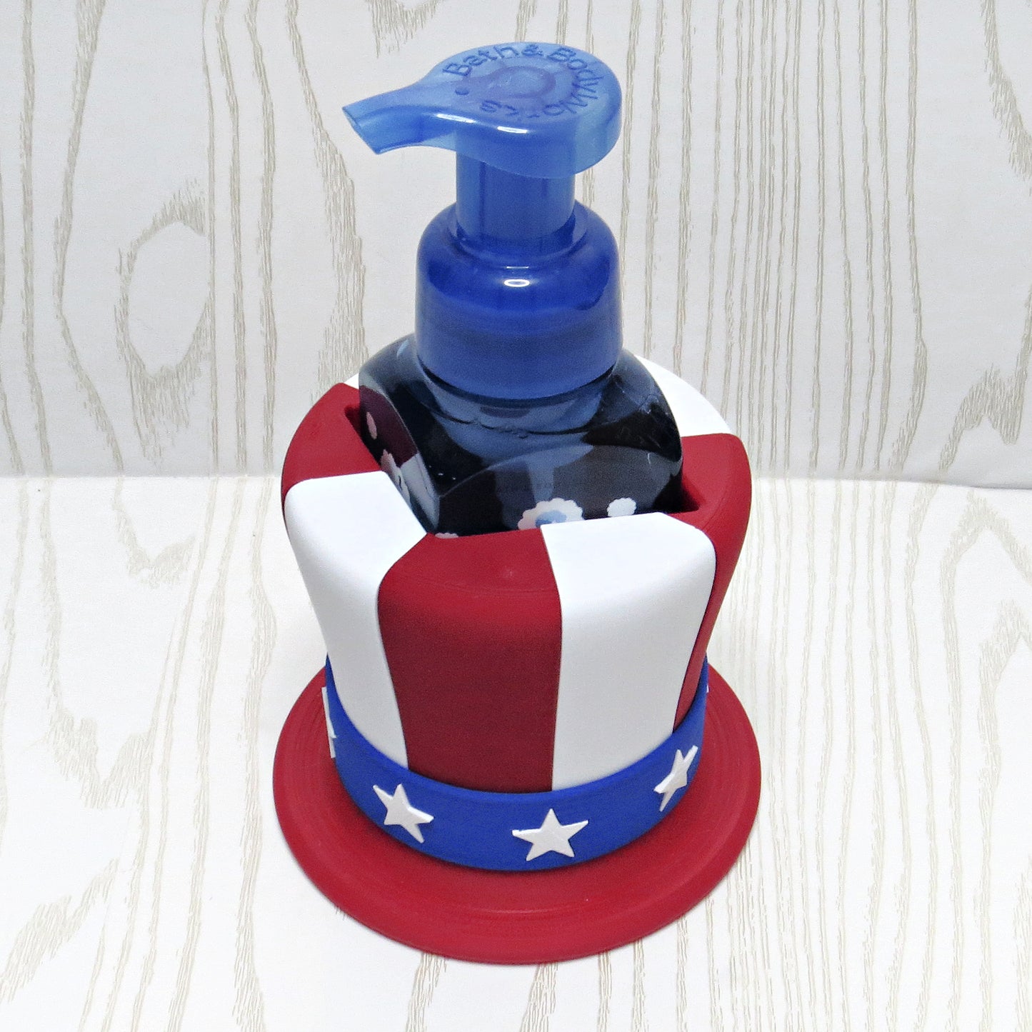 4th of July Uncle Sam Hat Foaming Soap Holder - lifestyle with soap bottle inserted