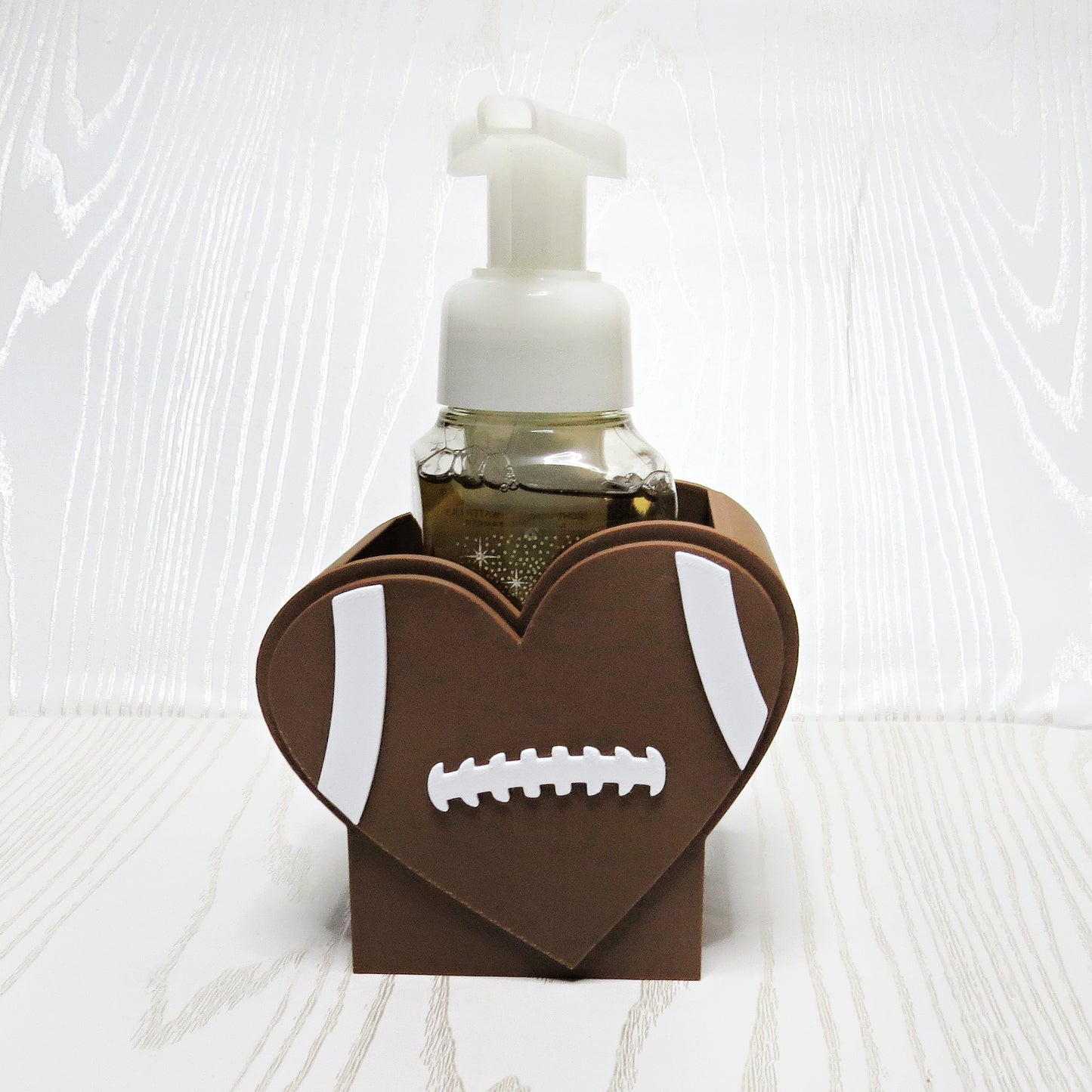 Football Heart Foaming Soap Holder for BBW Foam Soap Bottles - lifestyle with soap bottle inserted