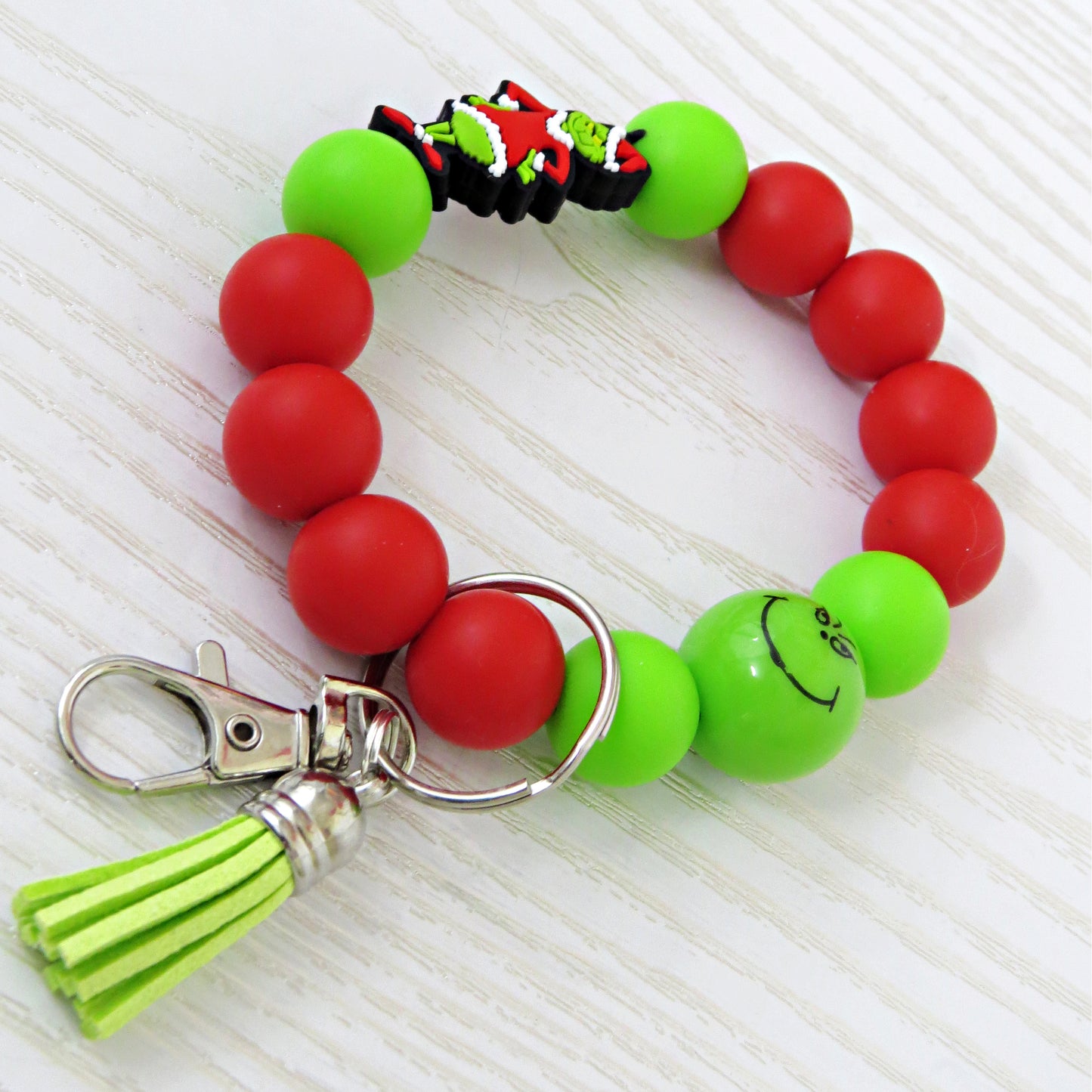 Christmas Beaded Wristlet Keychain – Red & Green Silicone Bracelet with Green Character Charm