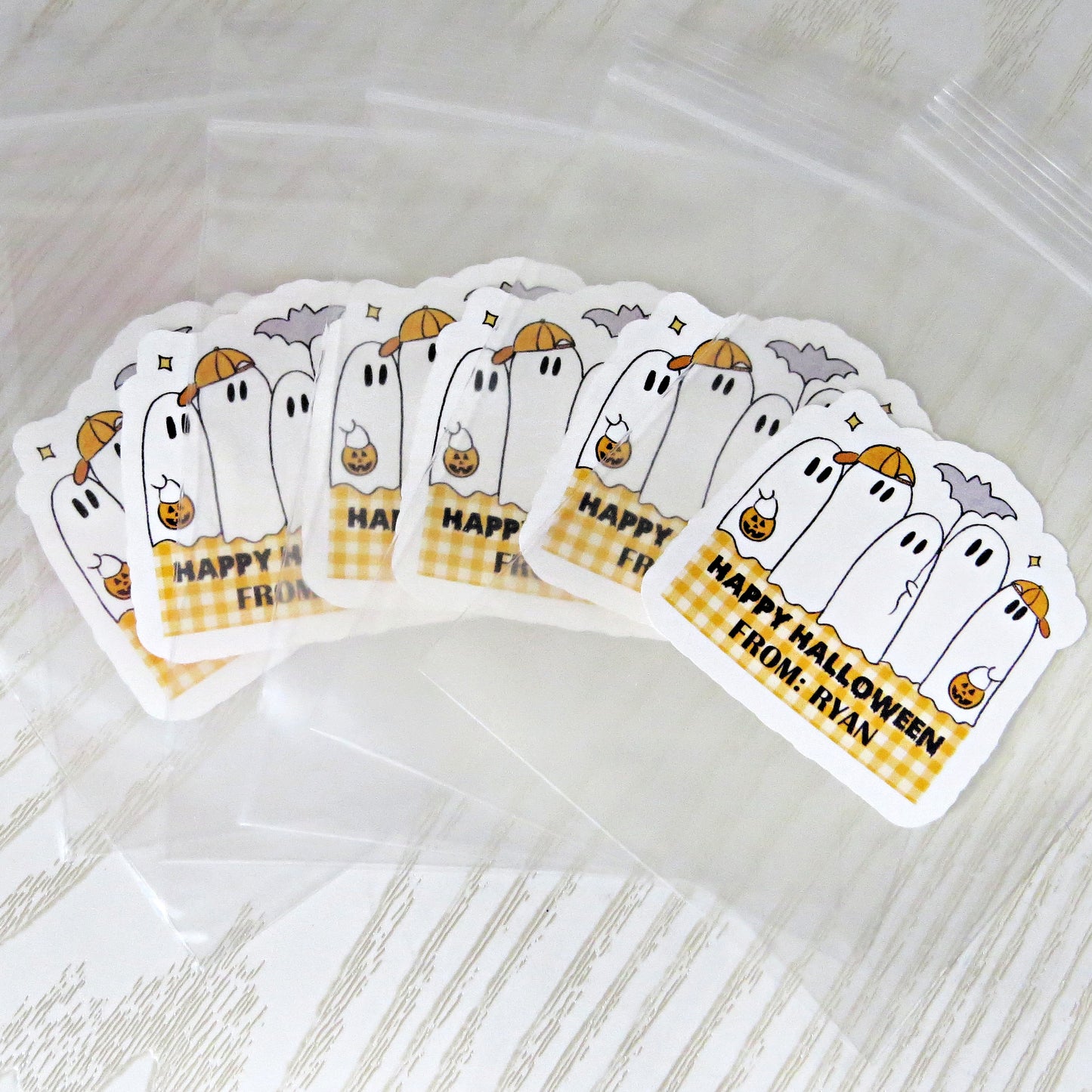 cute halloween ghost stickers with pumpkins and bats perfect for kids treat bags