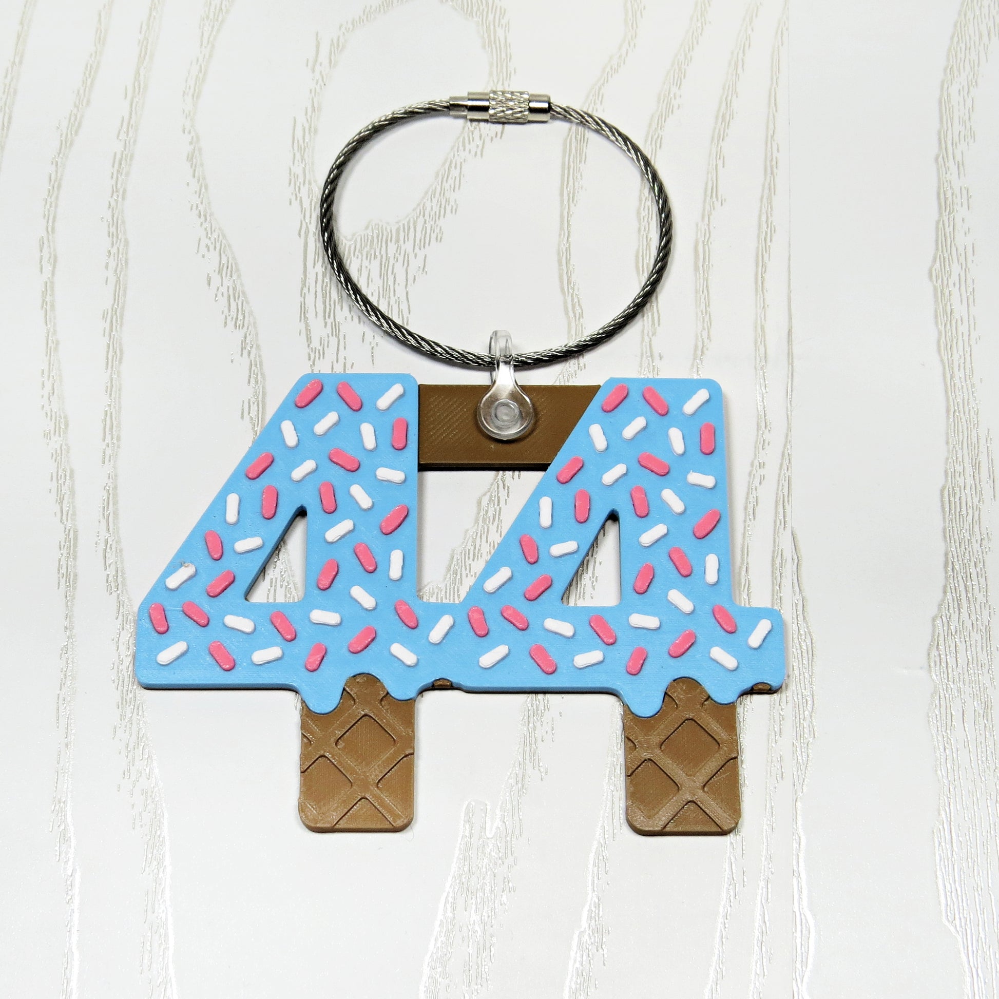 Personalized baseball softball drip number bag tag with sprinkle design and metal loop