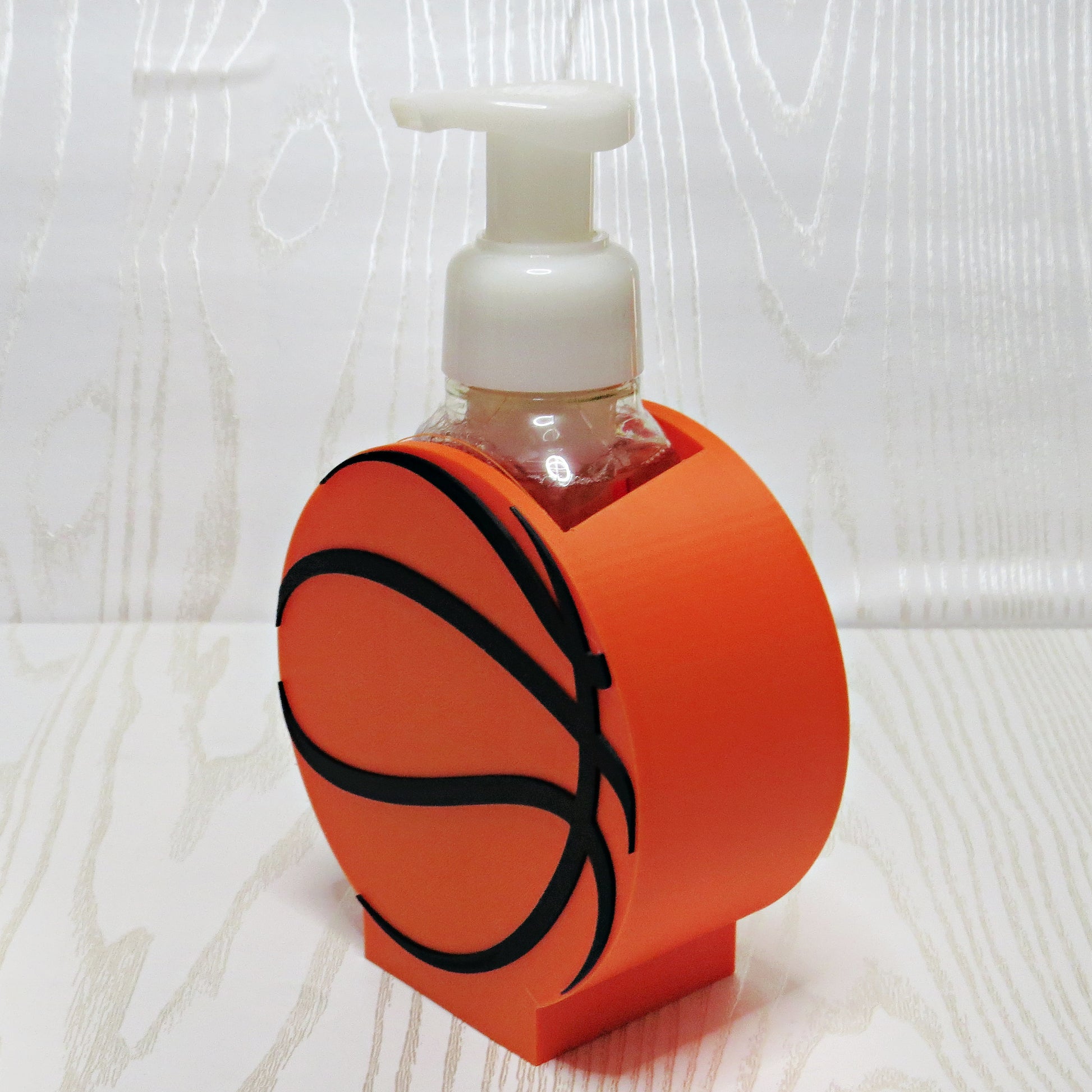 Basketball Soap Holder - top view showing pump opening