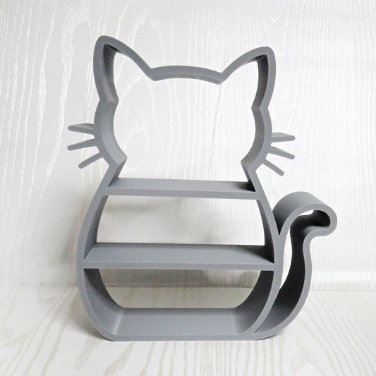 Gray cat shaped freestanding display shelf with open tiers, whiskers, and a curled tail