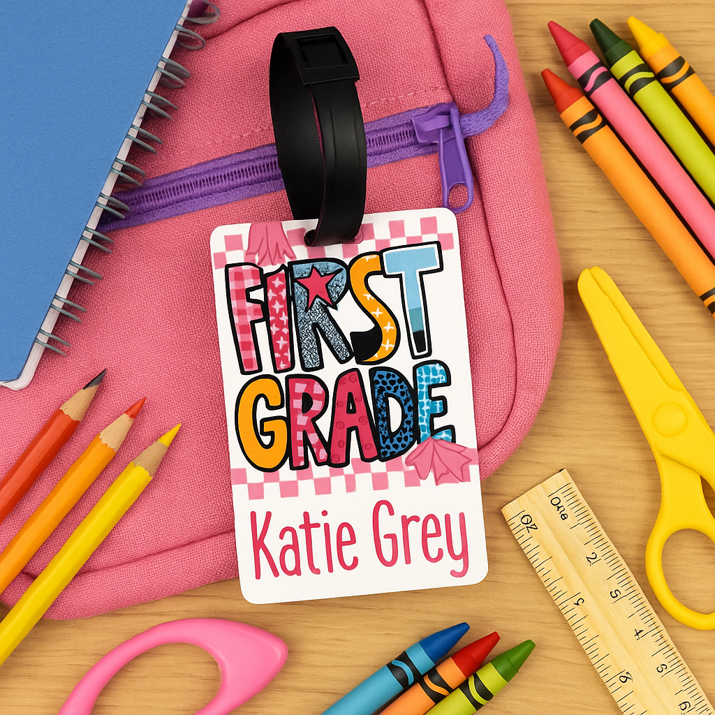 personalized-first-grade-bag-tag-with-name-katie-grey-school-supplies-crayons-notebook-pink-backpack