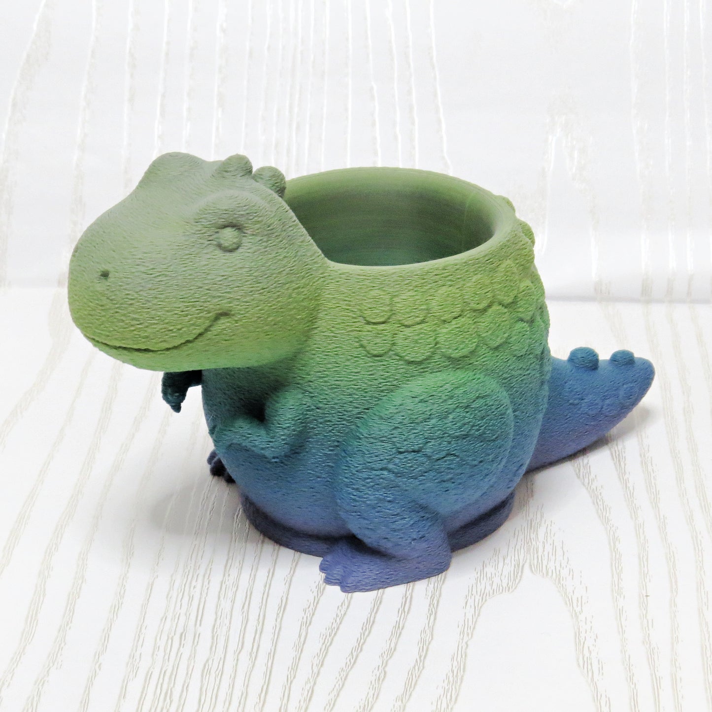 Cute Dinosaur Pencil Holder for Kids Desk | 3D Printed T Rex Desk Organizer f... - flat lay on desk surface