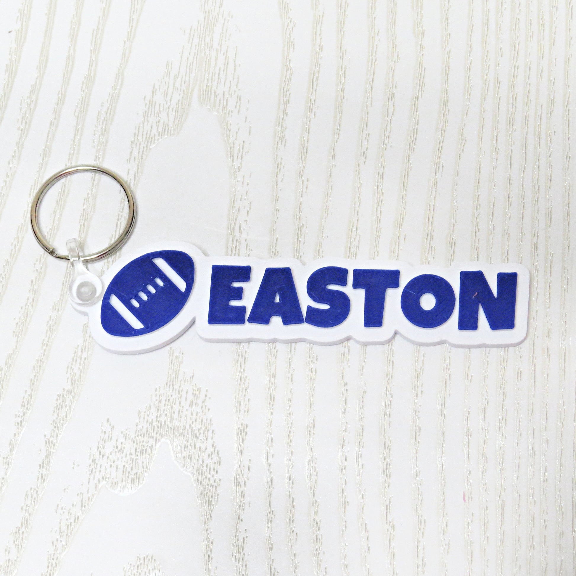 Personalized football keychain bag tag custom name 3d printed sports backpack accessory blue white football shape