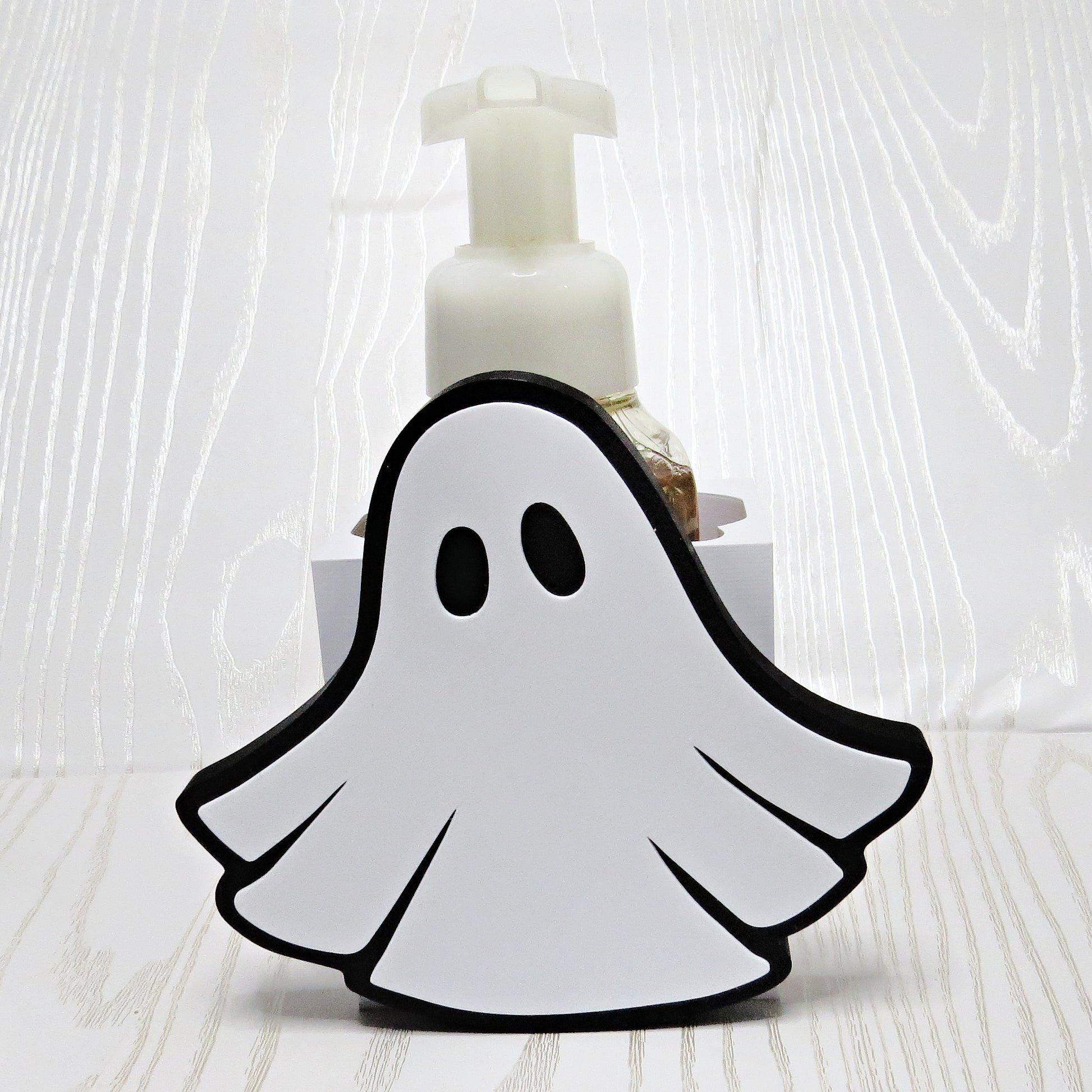 white-3d-printed-ghost-foaming-soap-holder-black-outline-oval-eyes-flowing-draped-body-halloween-bathroom-decor