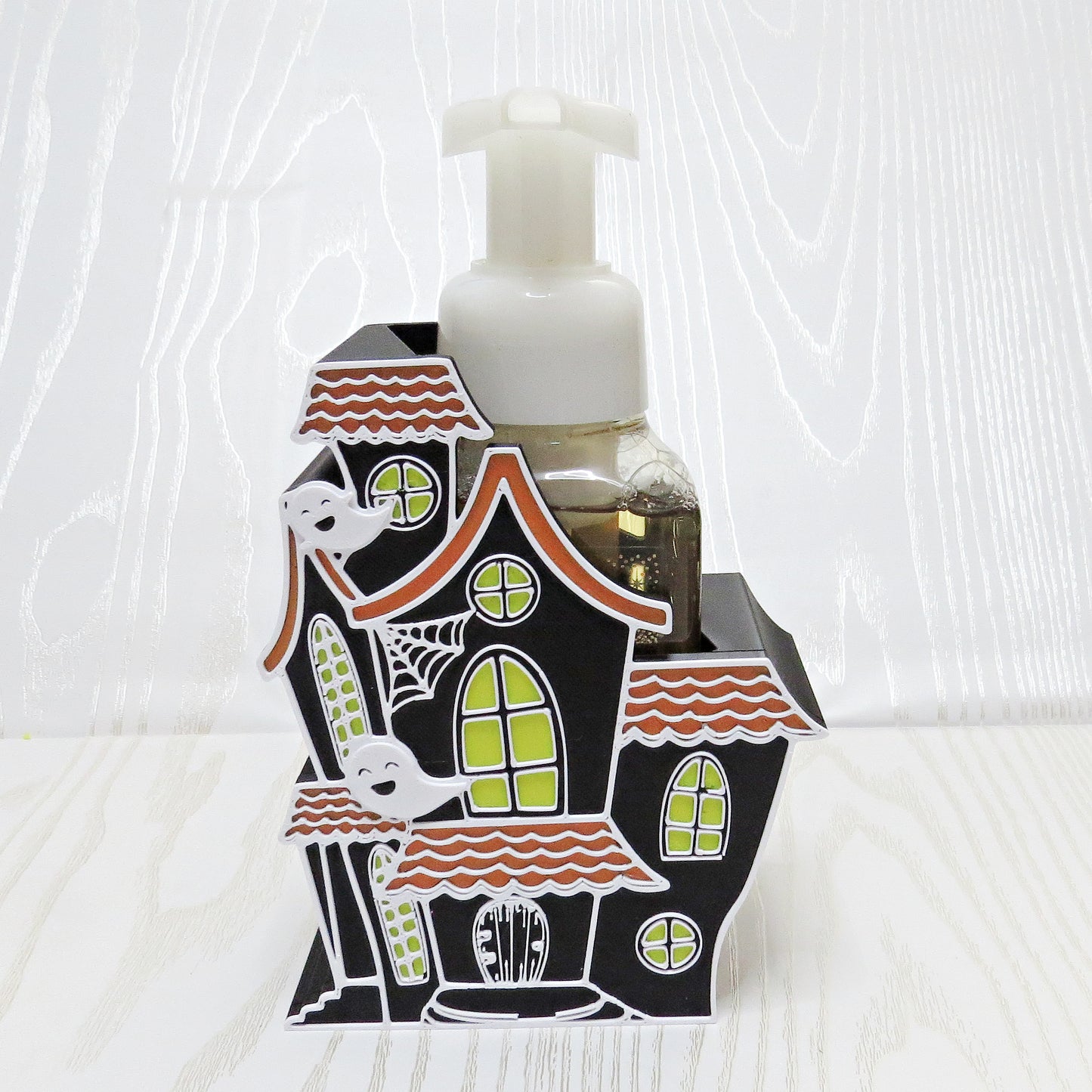 black-3d-printed-haunted-house-foaming-soap-holder-orange-roof-green-windows-ghosts-spider-web-halloween-decor