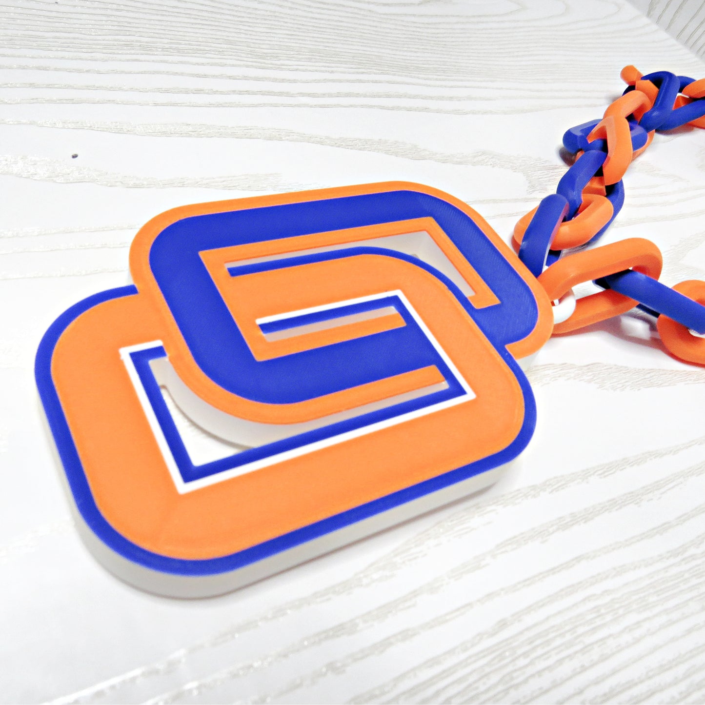 Plastic hype chain necklace in blue and orange for pep rallies