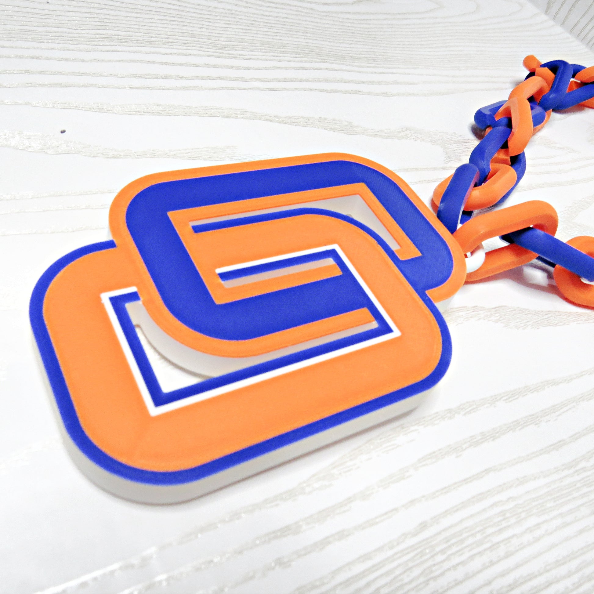 Plastic hype chain necklace in blue and orange for pep rallies