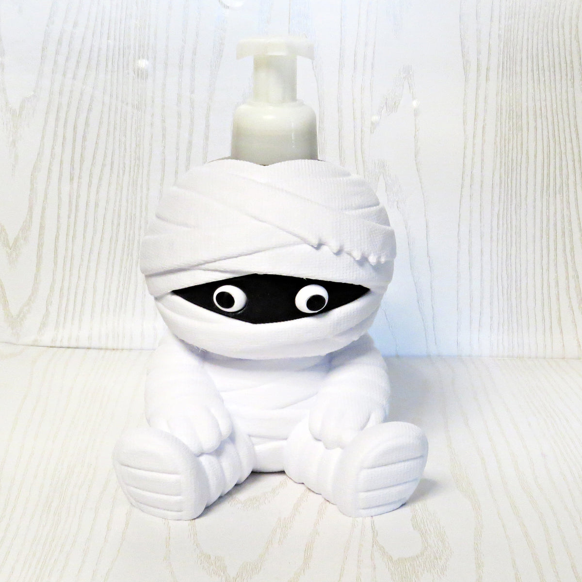 white-3d-printed-chubby-mummy-bandage-wrap-googly-eyes-sitting-foaming-soap-holder-halloween-spooky-bathroom-decor
