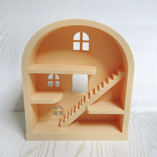 Peach arched mini dollhouse shelf with three levels, a staircase, and cut-out windows