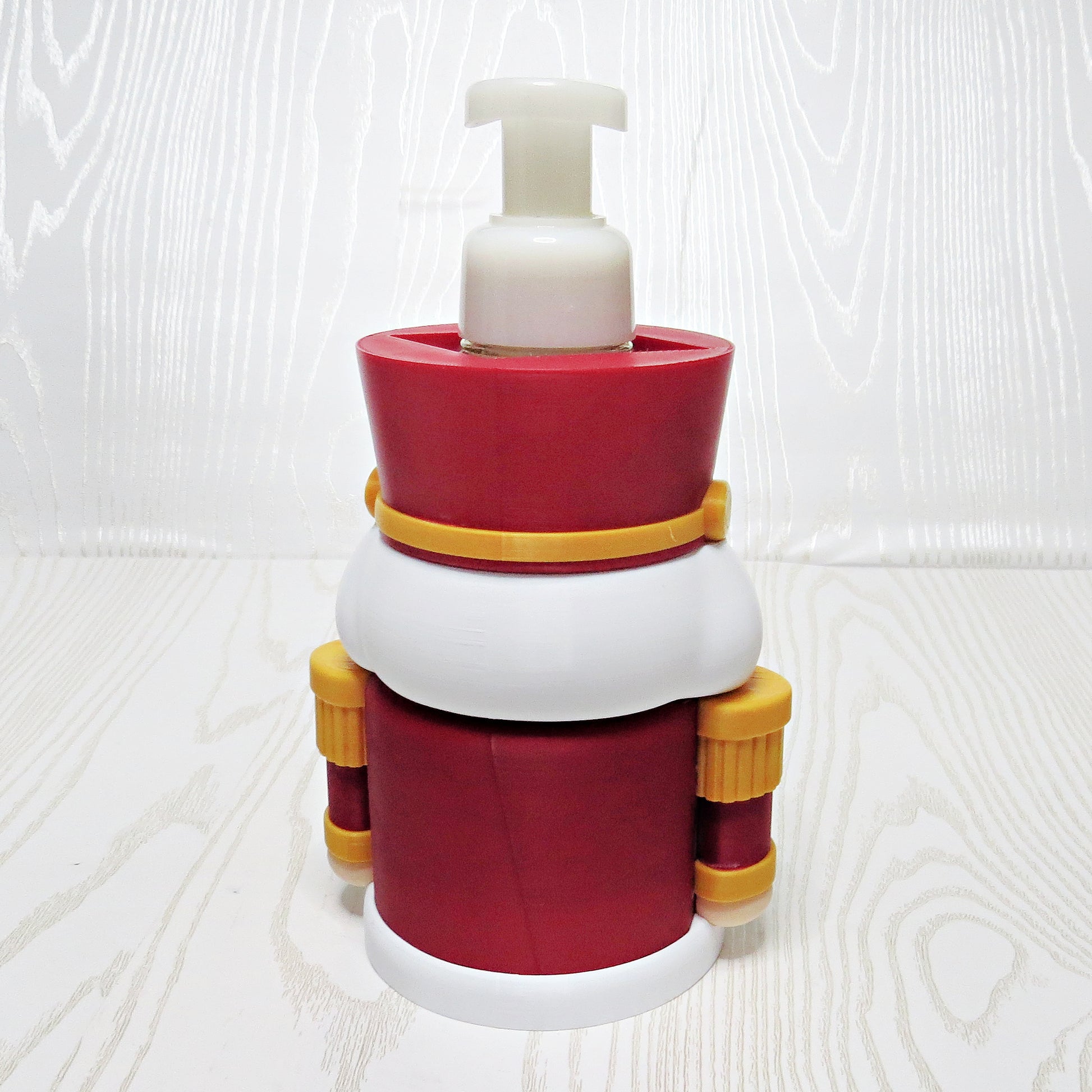 Nutcracker Foaming Soap Holder - Christmas Sink Decor - top view showing pump opening