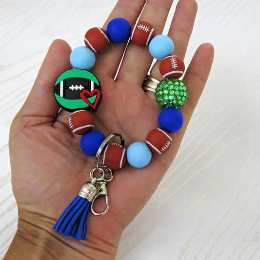 Football Beaded Wristlet with Green Bling Accent and Heart Charm – Game Day Keychain Bracelet for Moms & Fans