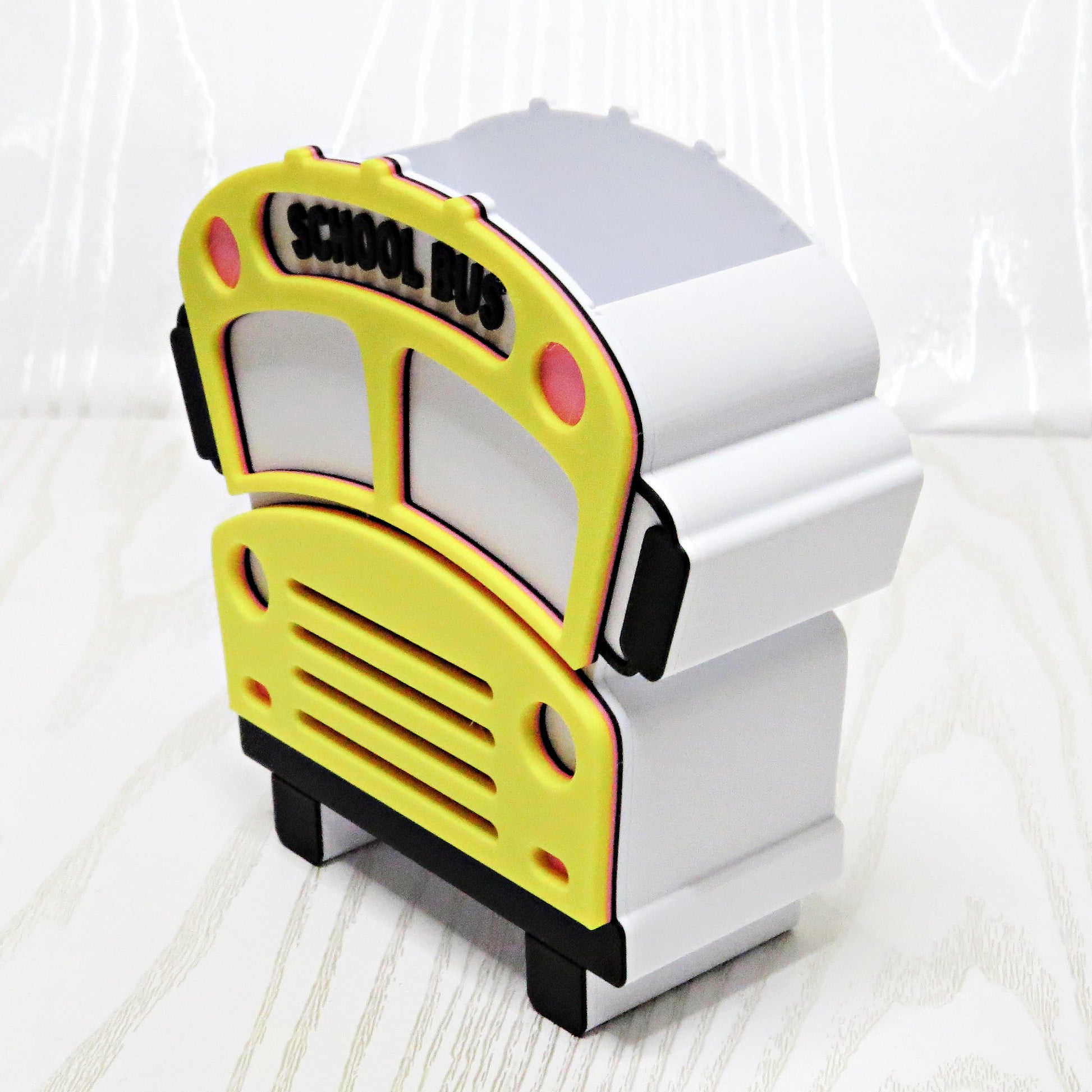 School Bus Pencil Holder - Desk Organizer for Classroom - flat lay on desk surface