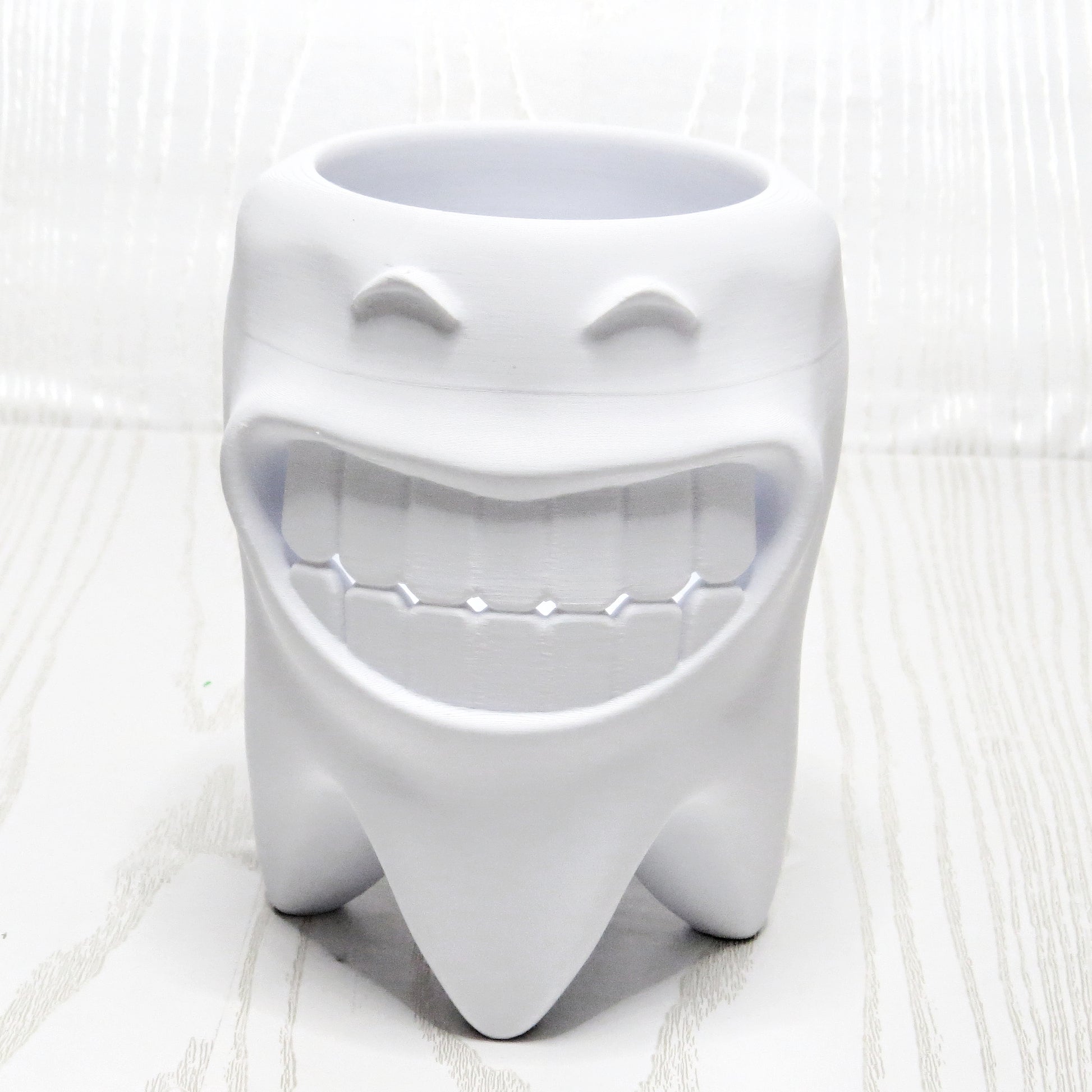 Smiling Tooth Holder - close-up design detail