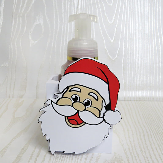 Smiling Santa face shaped foaming soap bottle holder for Christmas decor