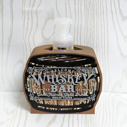Brown whiskey barrel shaped foaming soap bottle holder with welcome bar sign detail