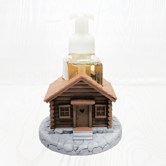 Rustic cabin foaming soap holder on countertop