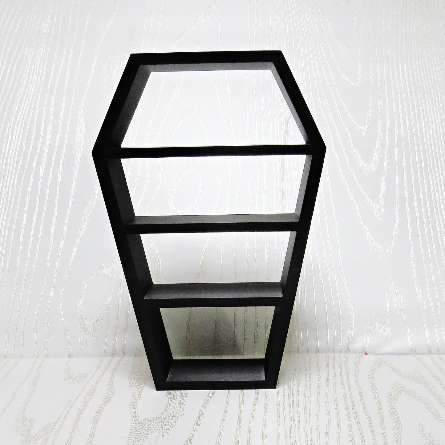 matte-black-3d-printed-coffin-silhouette-three-tier-open-shelf-hexagonal-top-tapered-body-gothic-halloween-dark-aesthetic-decor