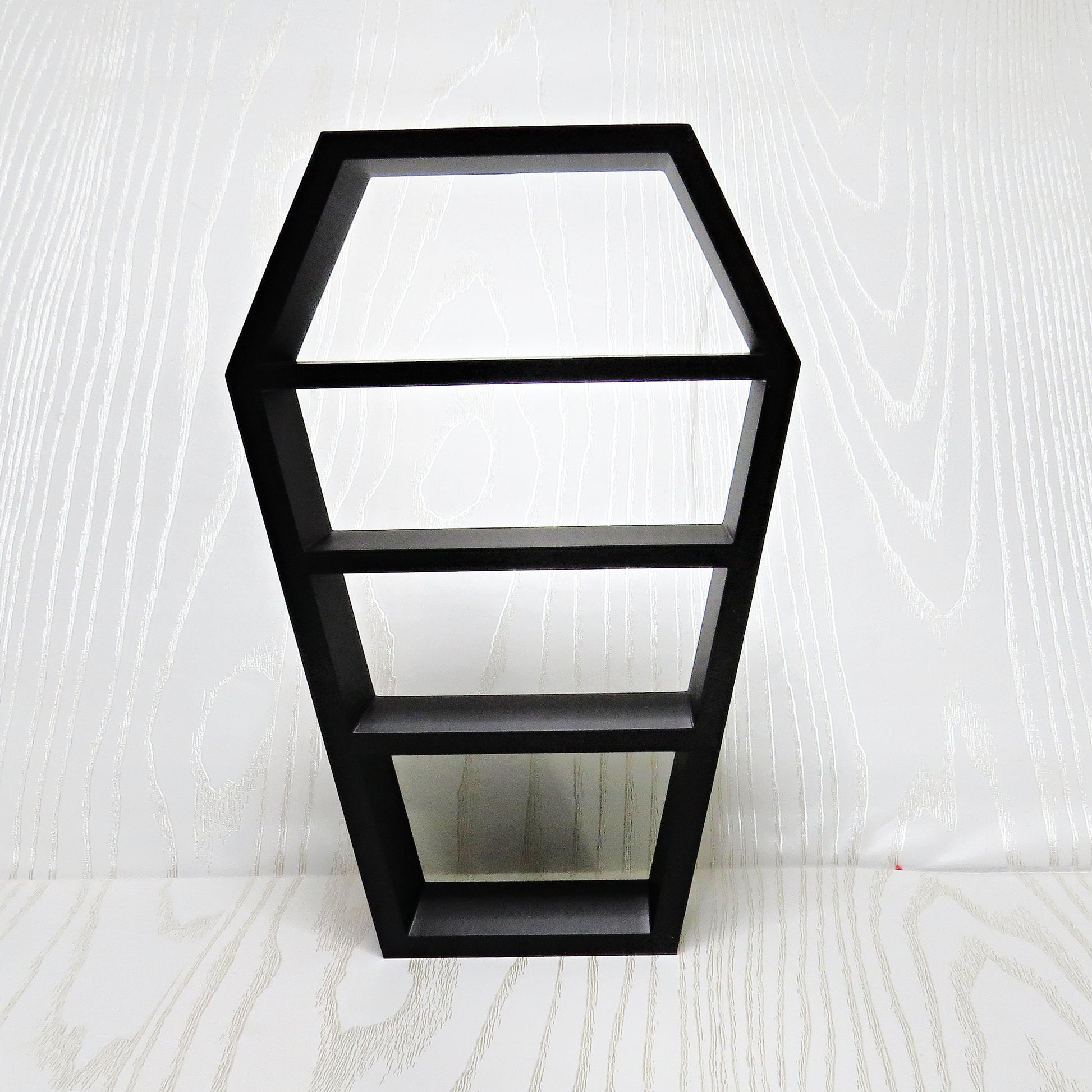 matte-black-3d-printed-coffin-silhouette-three-tier-open-shelf-hexagonal-top-tapered-body-gothic-halloween-dark-aesthetic-decor