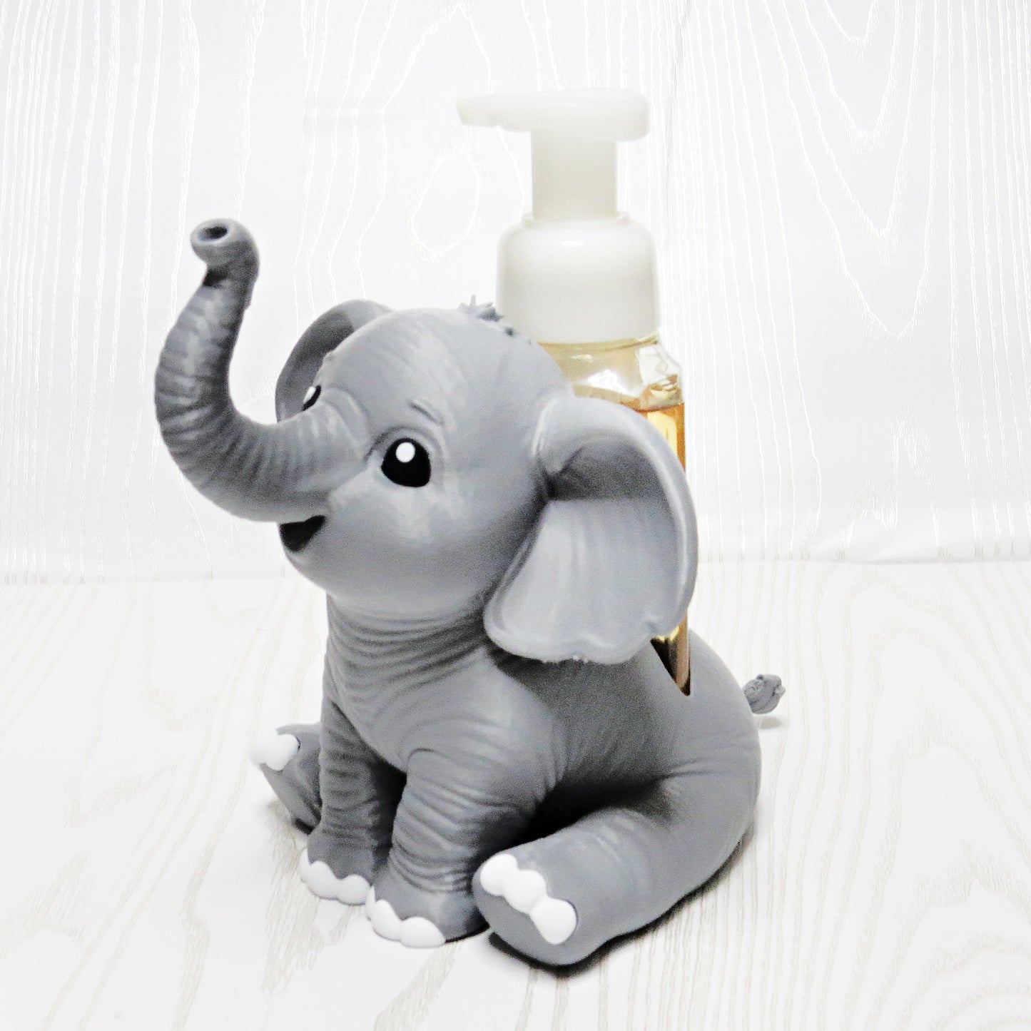 Elephant Foaming Soap Holder - Cute Bathroom Sink Decor - top view showing pump opening