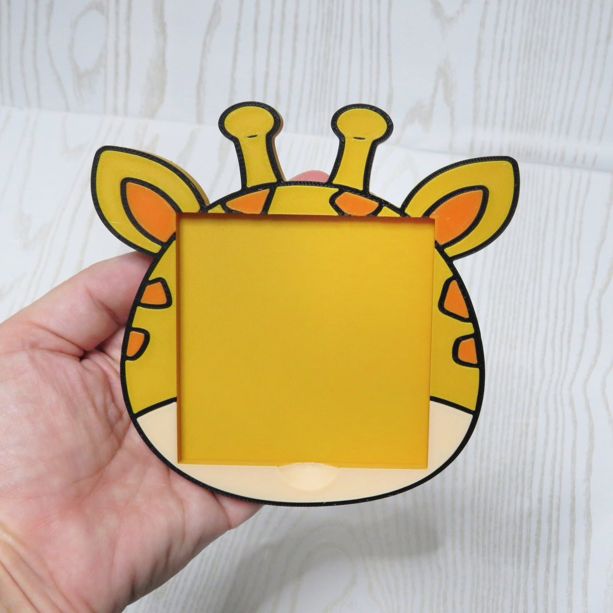 Cute yellow giraffe shaped sticky note holder for desk organization