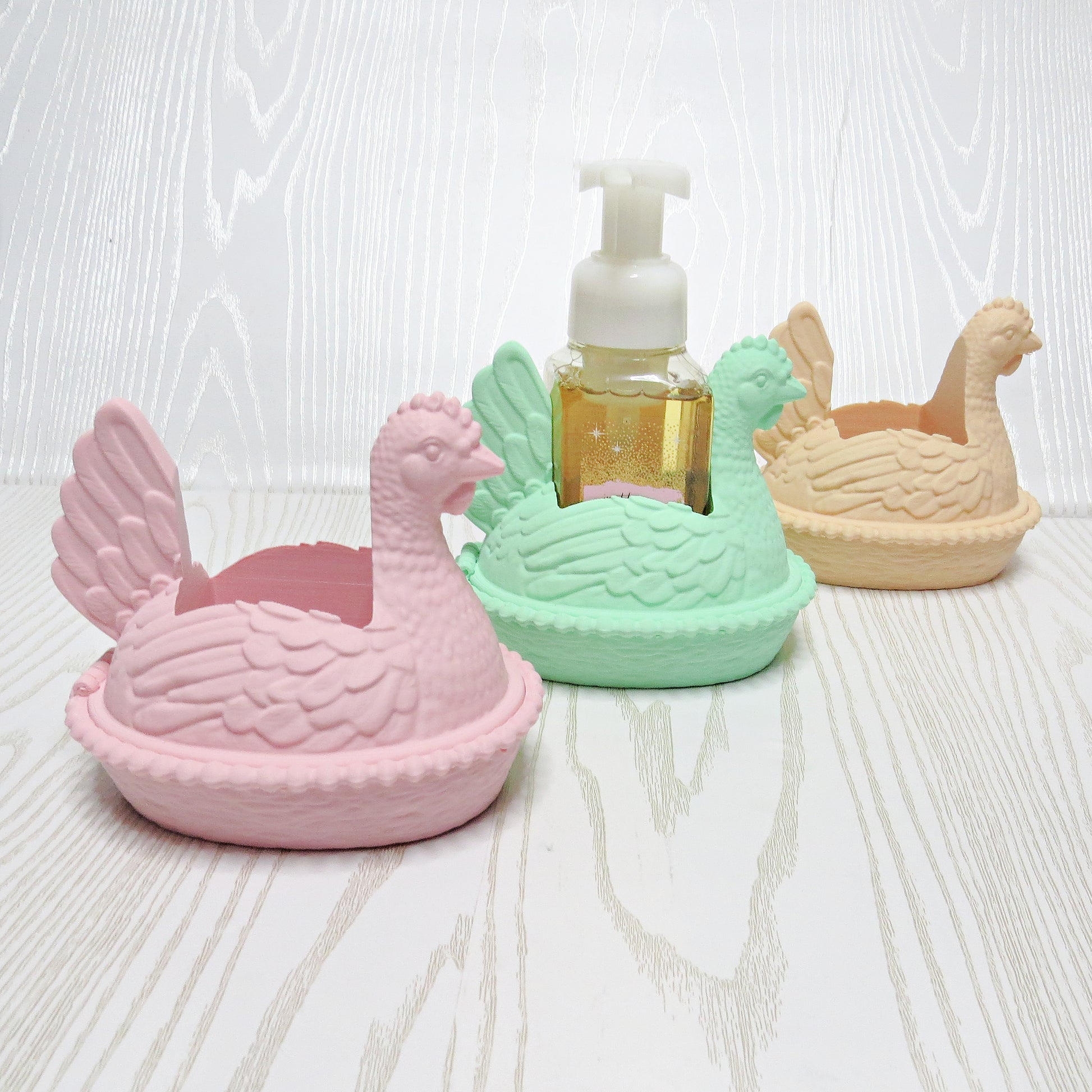 Hen on Nest Foaming Soap Holder - top view showing pump opening