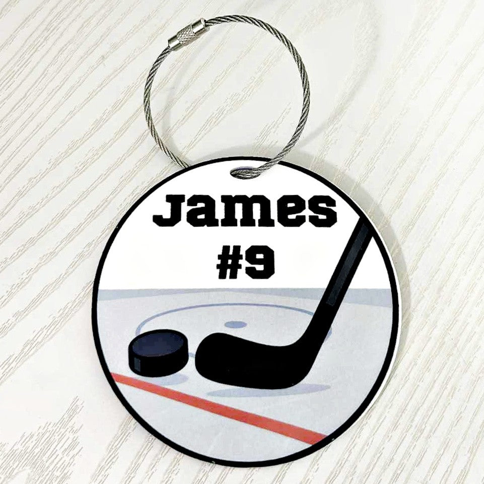 round-hockey-bag-tag-personalized-with-name-and-number-featuring-stick-and-puck