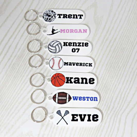 personalized-sports-keychains-custom-name-tags-football-basketball-baseball-volleyball-cheer-lacrosse-handmade-gift-for-athletes-coaches-and-sports-moms