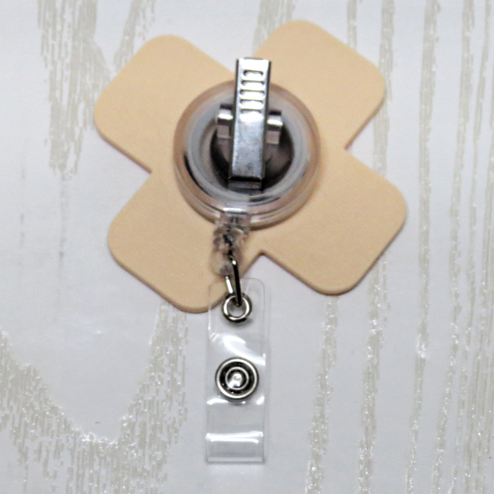 Nurse Bandage Badge Reel - Cute Medical ID Holder - close-up of printed design