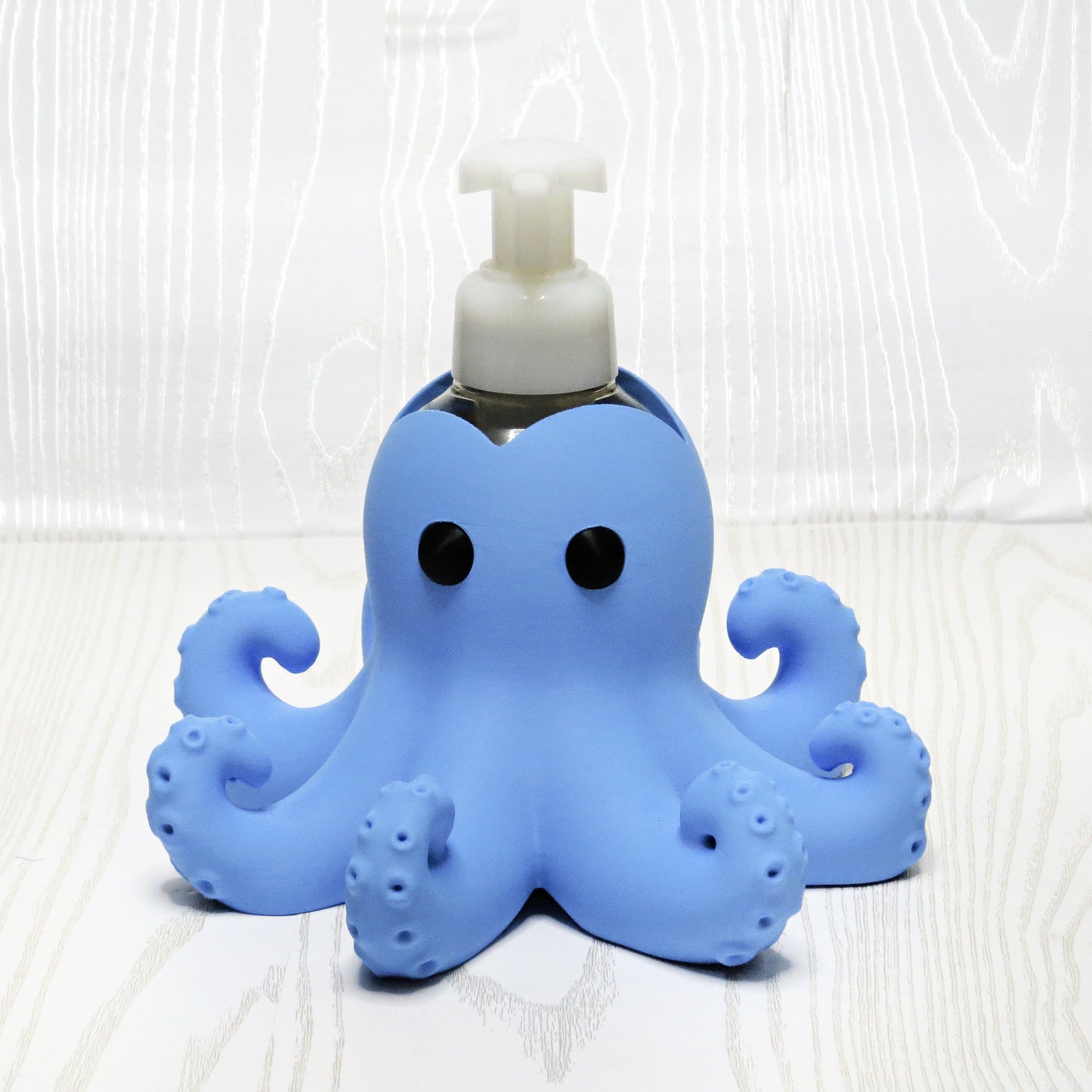 blue-3d-printed-octopus-foaming-soap-holder-curled-tentacles-suction-cups-ocean-bathroom-decor