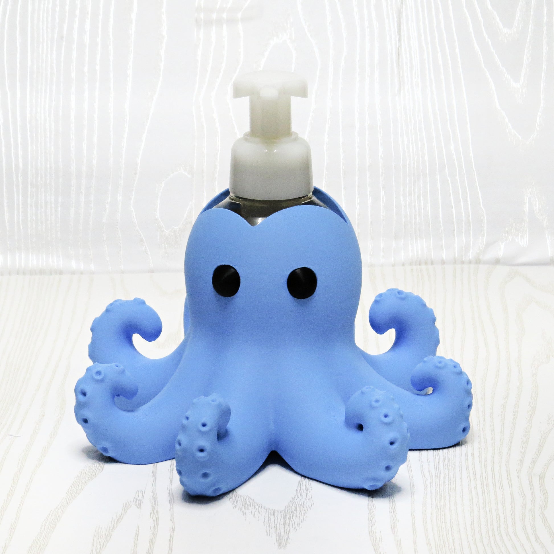 blue-3d-printed-octopus-foaming-soap-holder-curled-tentacles-suction-cups-ocean-bathroom-decor