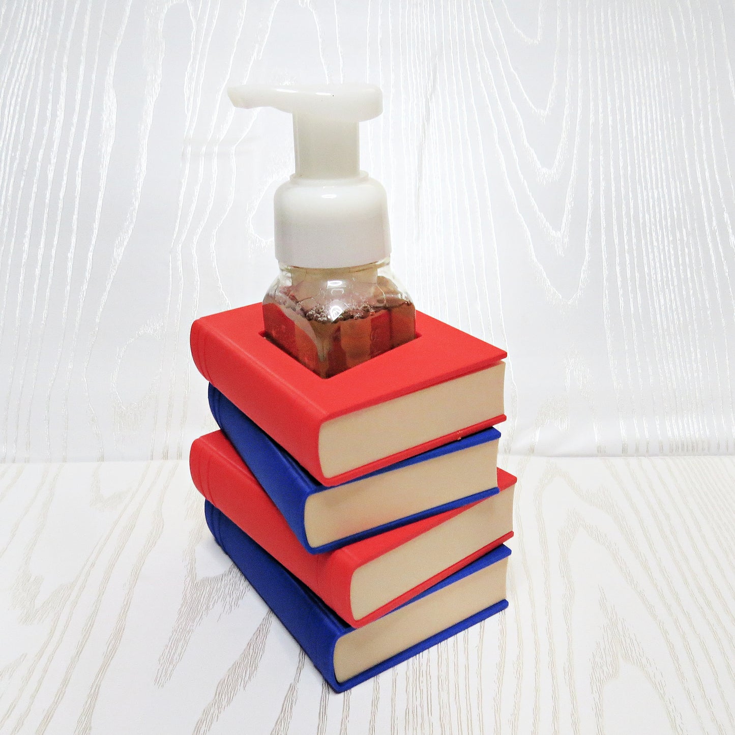 red-blue-3d-printed-stacked-books-foaming-soap-holder-cream-page-edges-teacher-book-lover-bathroom-desk-decor